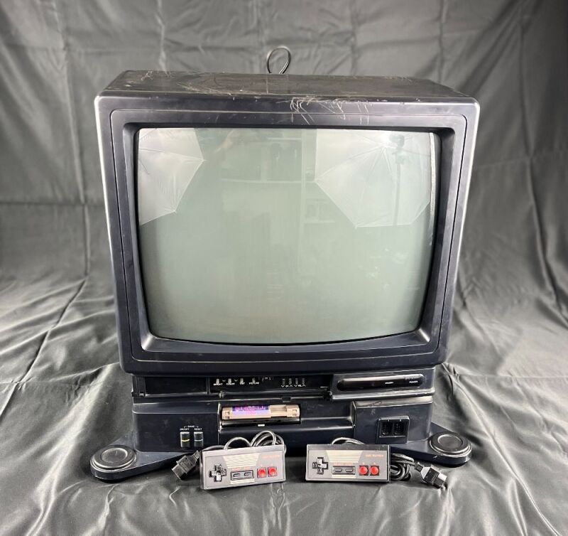 Nintendo Entertainment System Sharp TV with Controllers