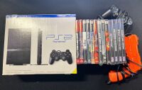 PlayStation 2 slim CIB with 13 games