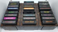 ATARI 2600 SYSTEM W/ 38 GAME CARTS, MANUALS (39) 5 JOYSTICK CONTROLLERS, 1 POINT MASTER CONTROL, 4 PADDLE CONTROLLERS - 2