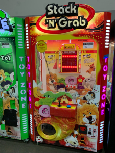 STACK N' GRAB STACKER/ PLUSH CRANE GAME MACHINE