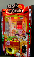 STACK N' GRAB STACKER/ PLUSH CRANE GAME MACHINE