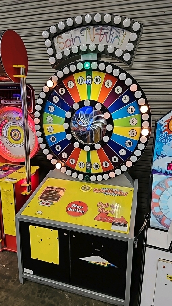 SPIN-N-WIN TICKET REDEMPTION GAME SKEEBALL INC.