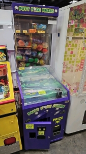 PUTT FORE PRIZES 4" CAPSULE PRIZE VENDING GAME OK MFG.