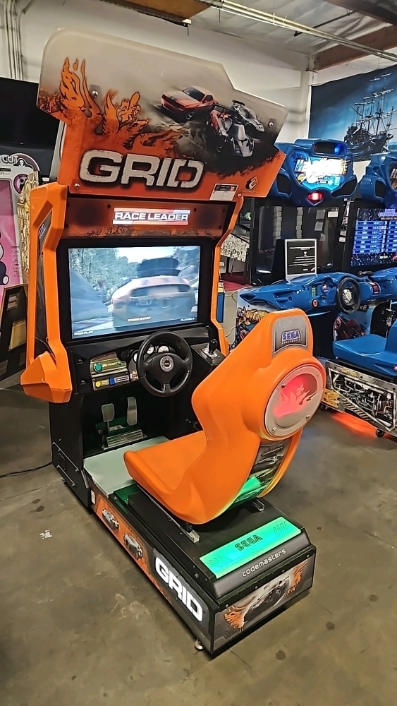GRID 32 LCD SITDOWN RACING ARCADE GAME SEGA #1