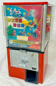 VINTAGE 1980's JAPANESE COIN-OP CAPSULE VENDING HEAD W/ ROBOT TOY CAPSULES