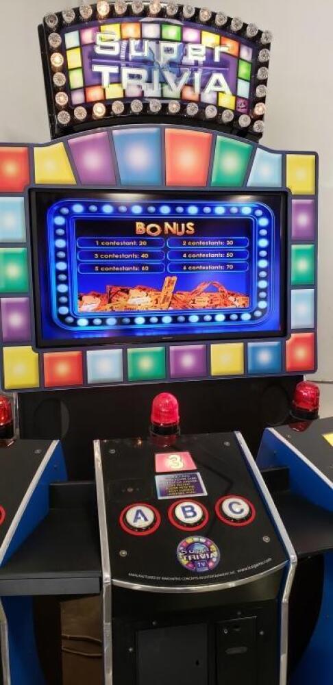 SUPER TRIVIA DELUXE 6 PLAYER ICE ARCADE GAME